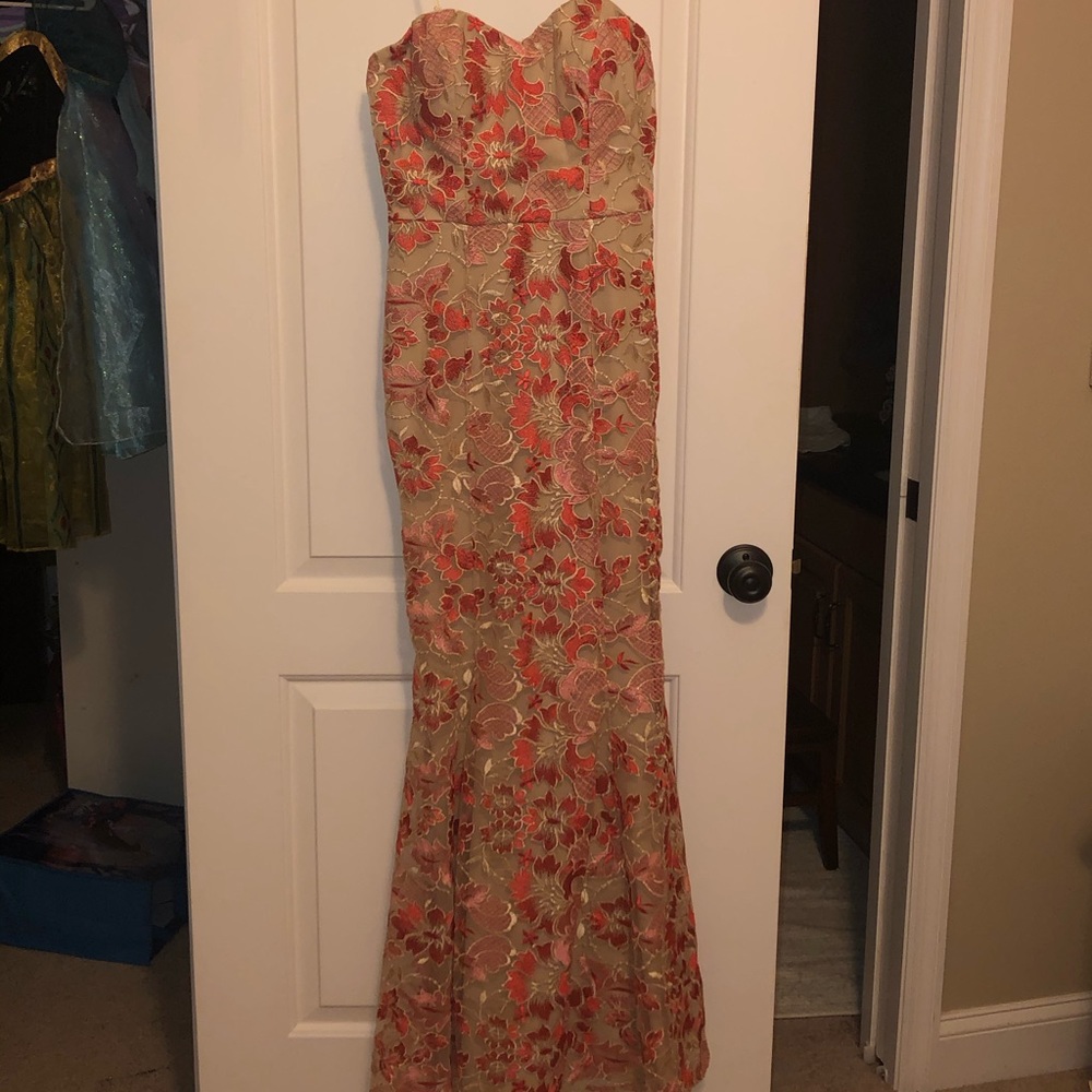 Mermaid shaped lace ball gown